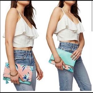 Rachel Pally reversible clutch